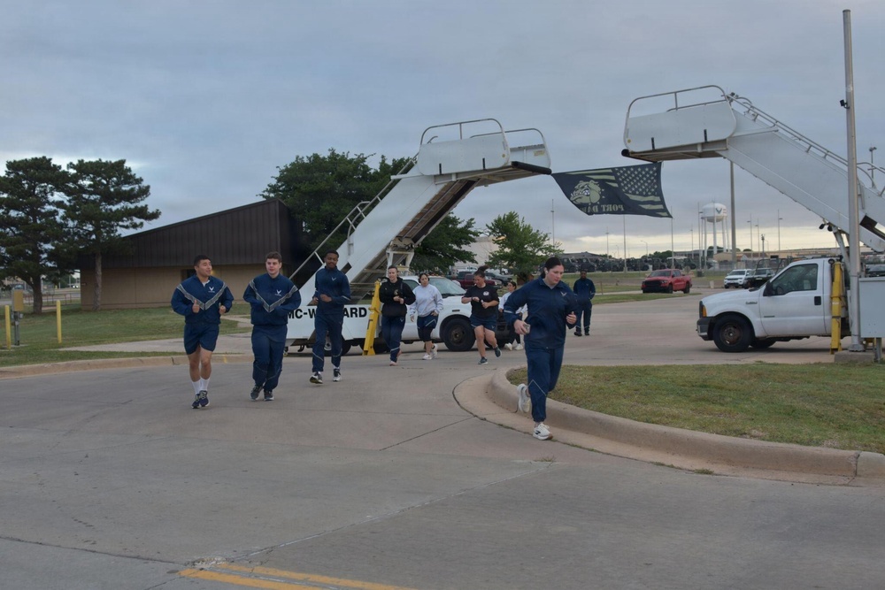 97th LRS Airmen run to honor fallen members of ‘Port Dawg’ community