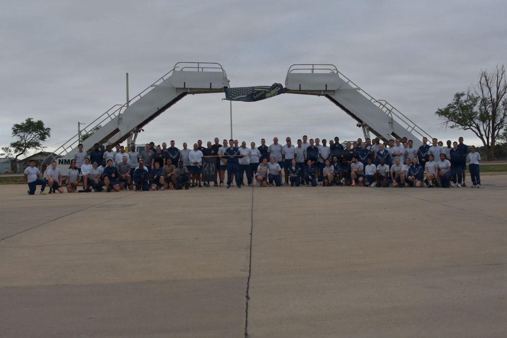 97th LRS Airmen run to honor fallen members of ‘Port Dawg’ community