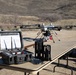 Military UAS Ground Control Station and Multi-Rotor Drone Staged at Desert Training Site