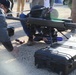 Military Personnel Assemble Unmanned Aircraft System During Field Exercise