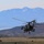 U.S. Army AH-64 Apache Attack Helicopter Conducts Low-Level Flight Operations Over Mountain Terrain