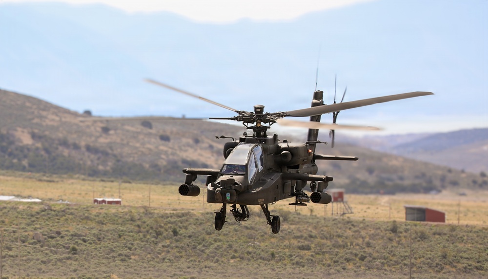U.S. Army AH-64 Apache Attack Helicopter Conducts Low-Level Flight Over High Desert Training Range