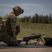 U.S. Army Soldier Prepares to Engage in a Live Fire Range Exercise during the Best Squad Competition