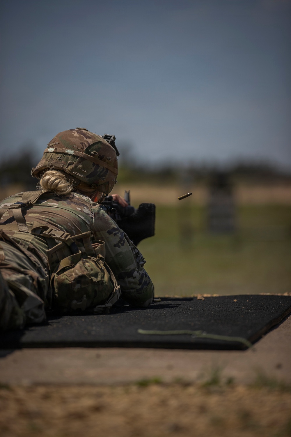 U.S. Army Soldier Engages in a Live Fire Range Exercise during the Best Squad Competition