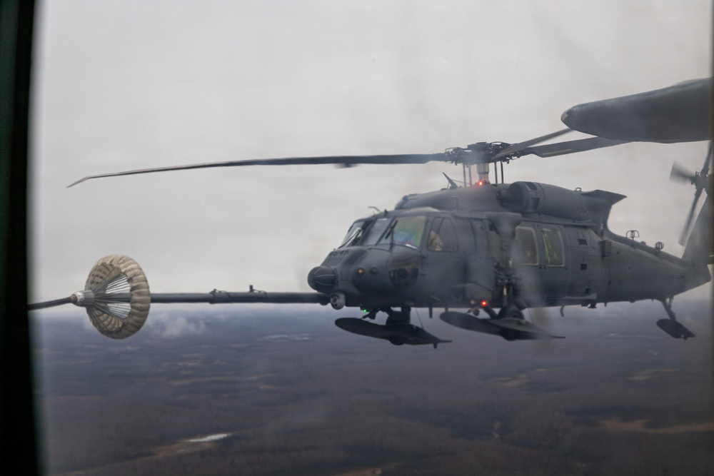 VMGR-152 executes low altitude flight operations, aerial refueling
