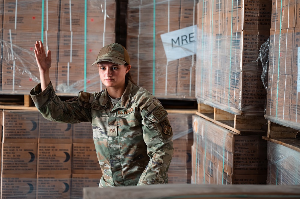 FSS Airmen unload MREs