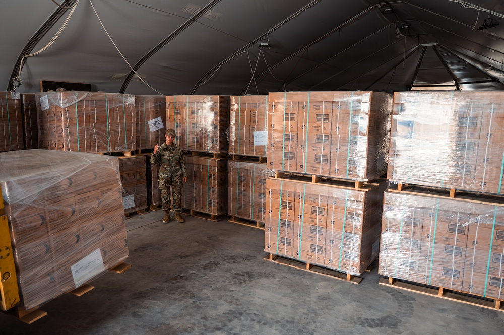 FSS Airmen unload MREs