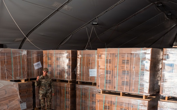 FSS Airmen unload MREs