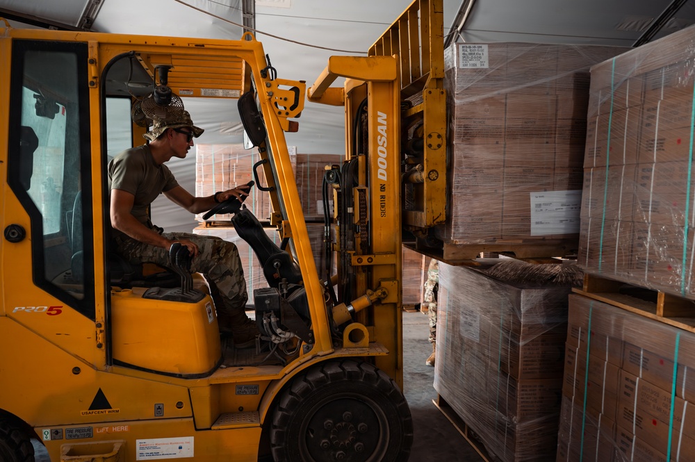 FSS Airmen unload MREs