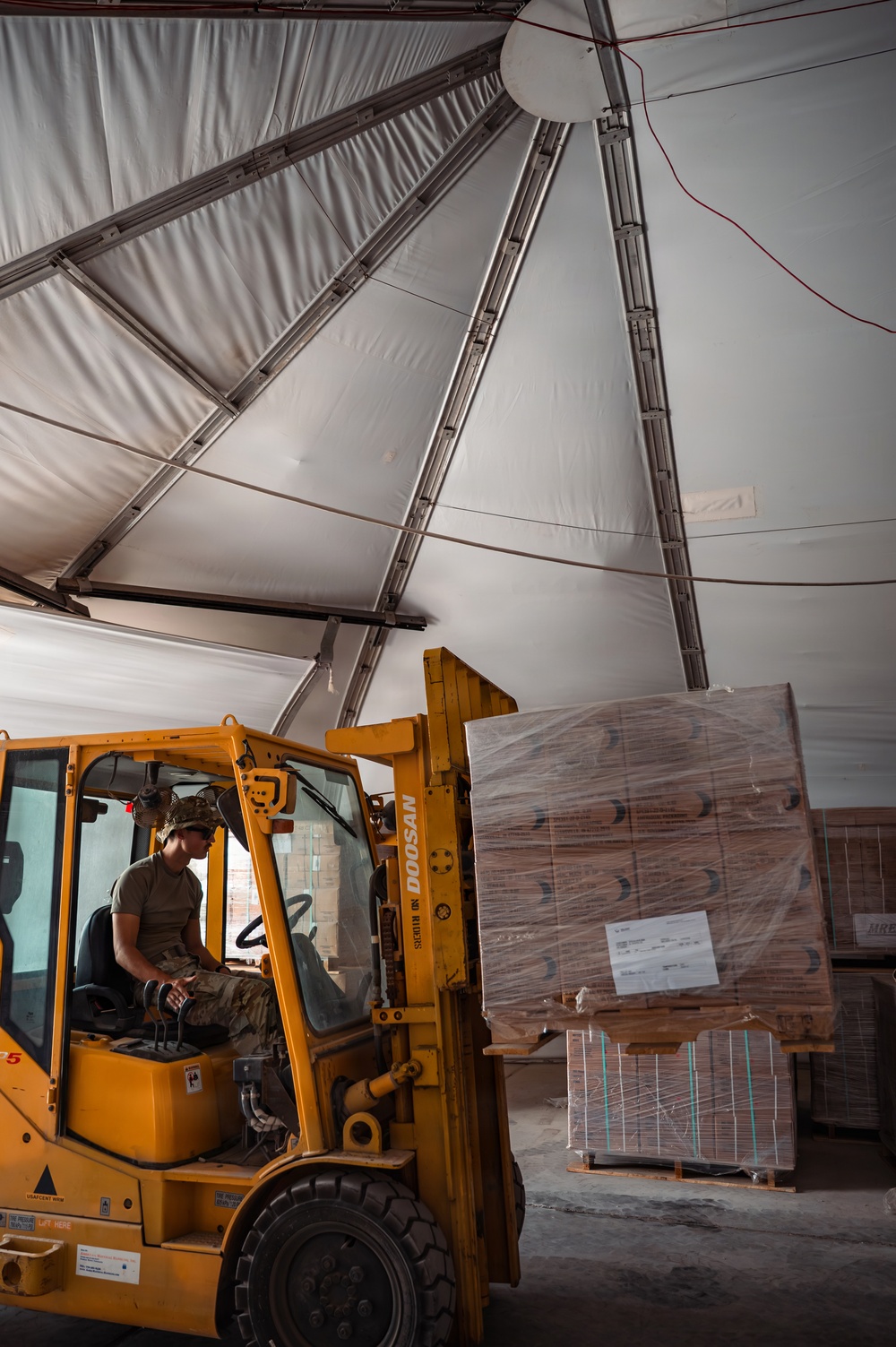 FSS Airmen unload MREs