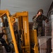 FSS Airmen unload MREs