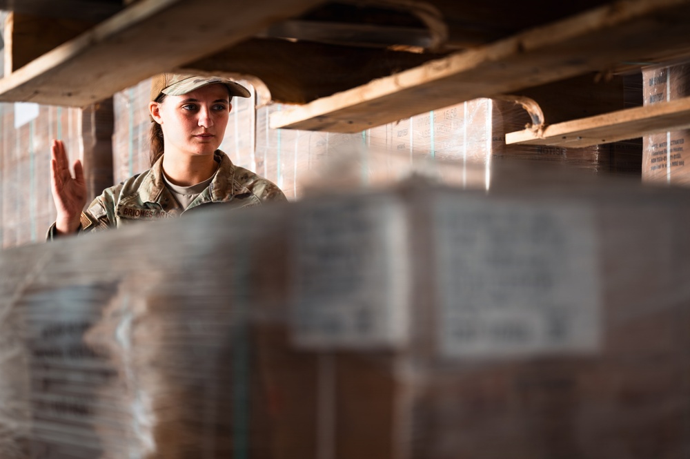 FSS Airmen unload MREs