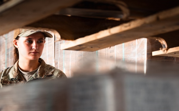 FSS Airmen unload MREs