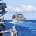 USS Mustin conducts a replenishment-at-sea with USNS Arctic