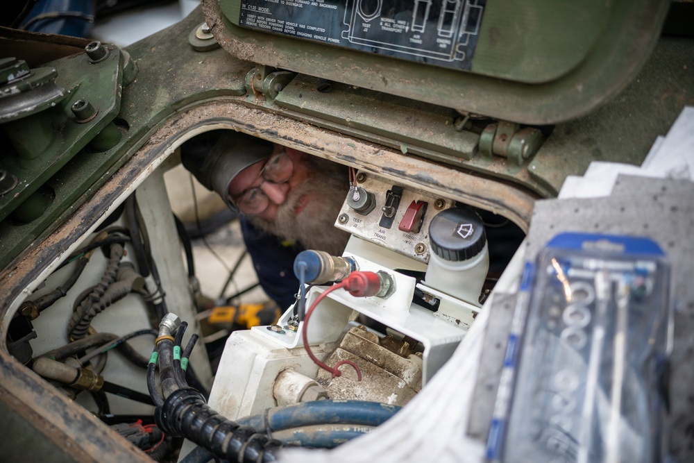 TLSC-EA mechanic repairs a M1126 Stryker Infantry Carrier Vehicle