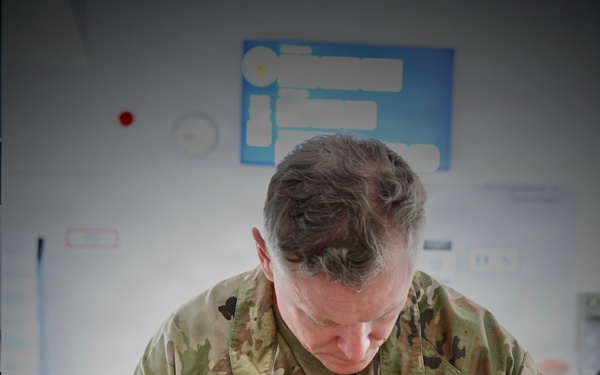 USAG Stuttgart Commander Col. Edward J. Sanford re-registers his vehicle on May 20, 2026