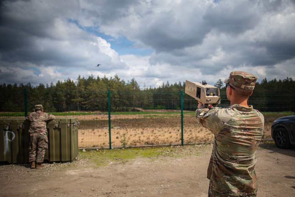 U.S. Army Soldiers conduct training with the Drone Buster counter-unmanned aerial systems device at Pabradė Training Area, Lithuania