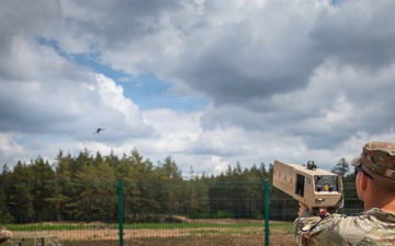 U.S. Army Soldiers conduct training with the Drone Buster counter-unmanned aerial systems device at Pabradė Training Area, Lithuania