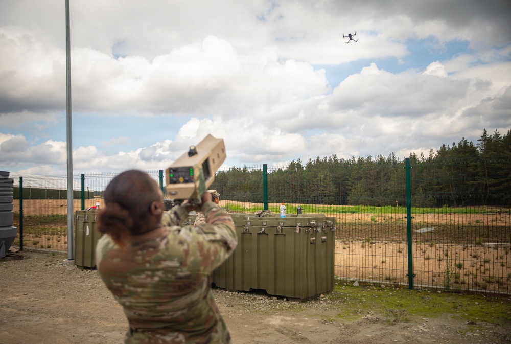 U.S. Army Soldiers conduct training with the Drone Buster counter-unmanned aerial systems device at Pabradė Training Area, Lithuania