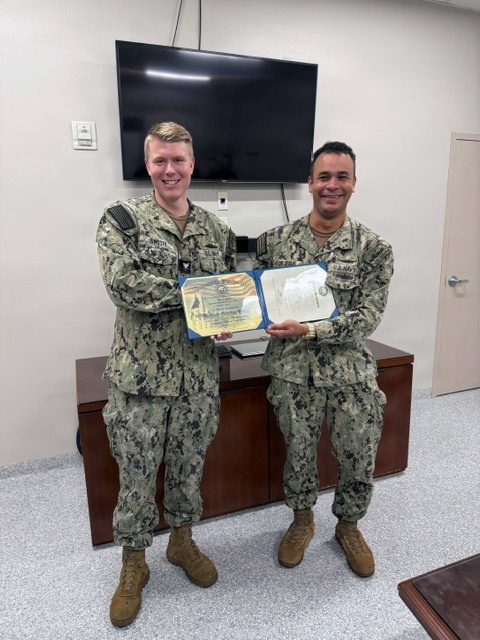 BM2 Smith re-enlists
