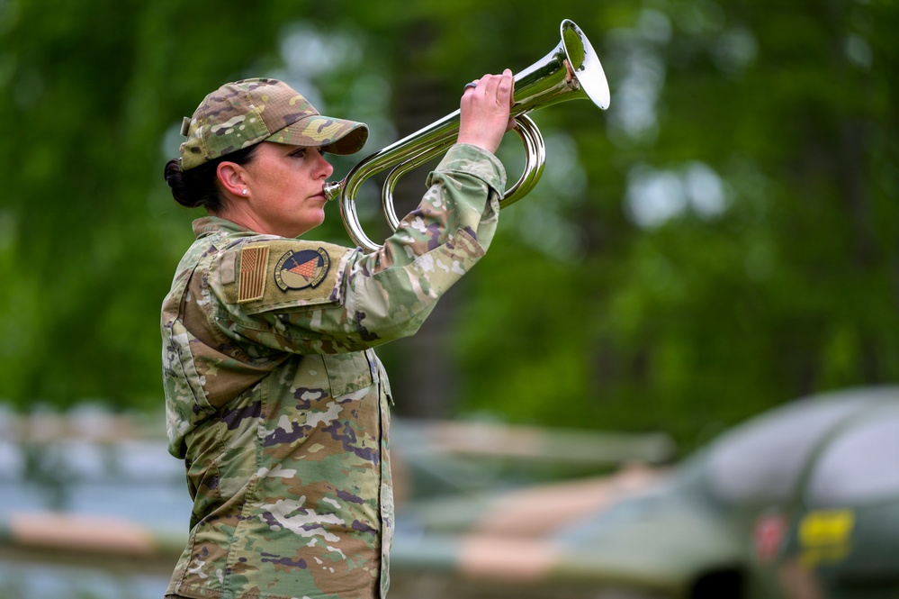 McDonald Plays Bugle at Memorial Ceremony