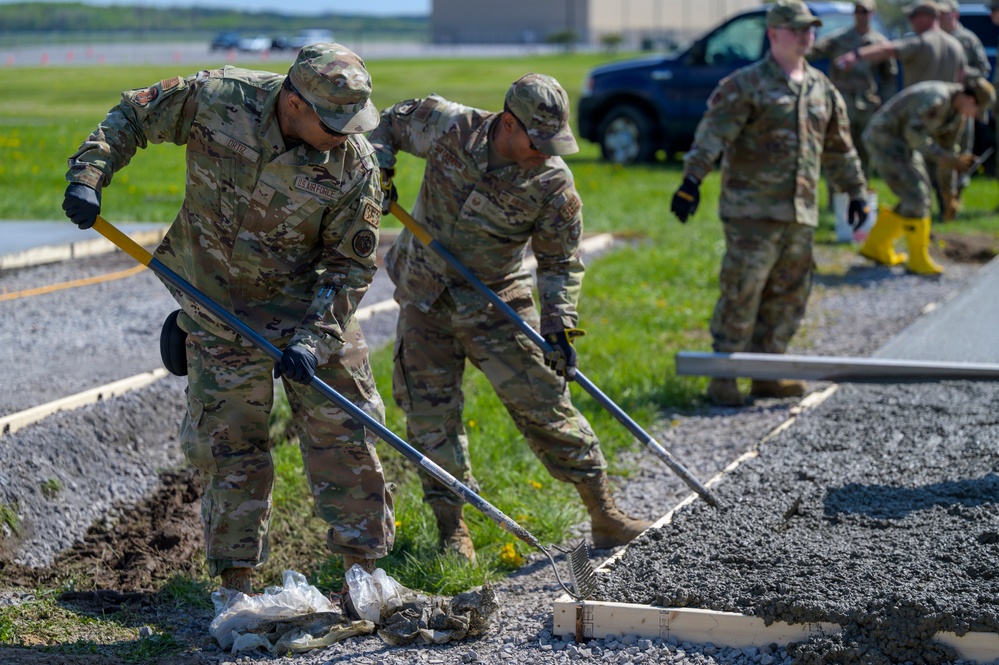 Airmen Work Concrete Pad Molds for CAP