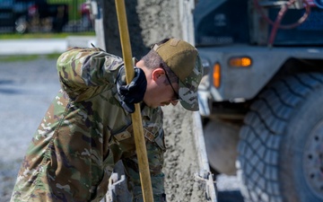 Myers Rakes Concrete for CAP Pads