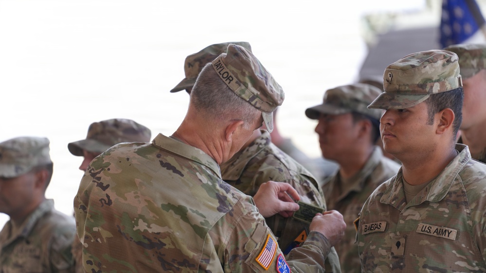 1st Armored Division Soldiers Receive Distinguished and Superior Shooter Patches