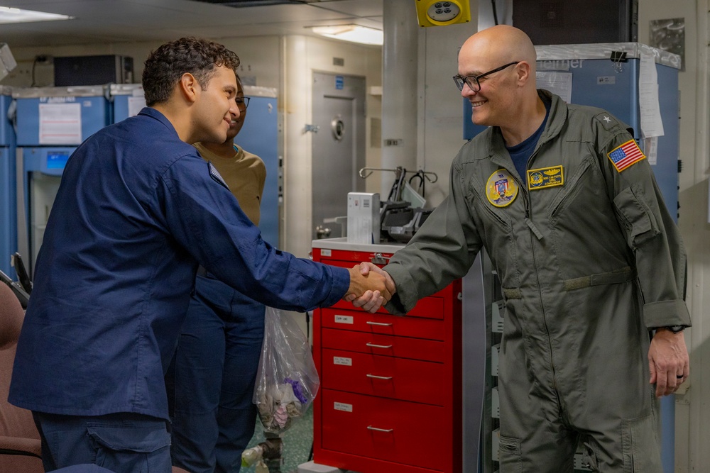 Rear Adm. Michael Van Poots, Deputy Commander, Submarine Forces, visits USS Frank Cable (AS 40)