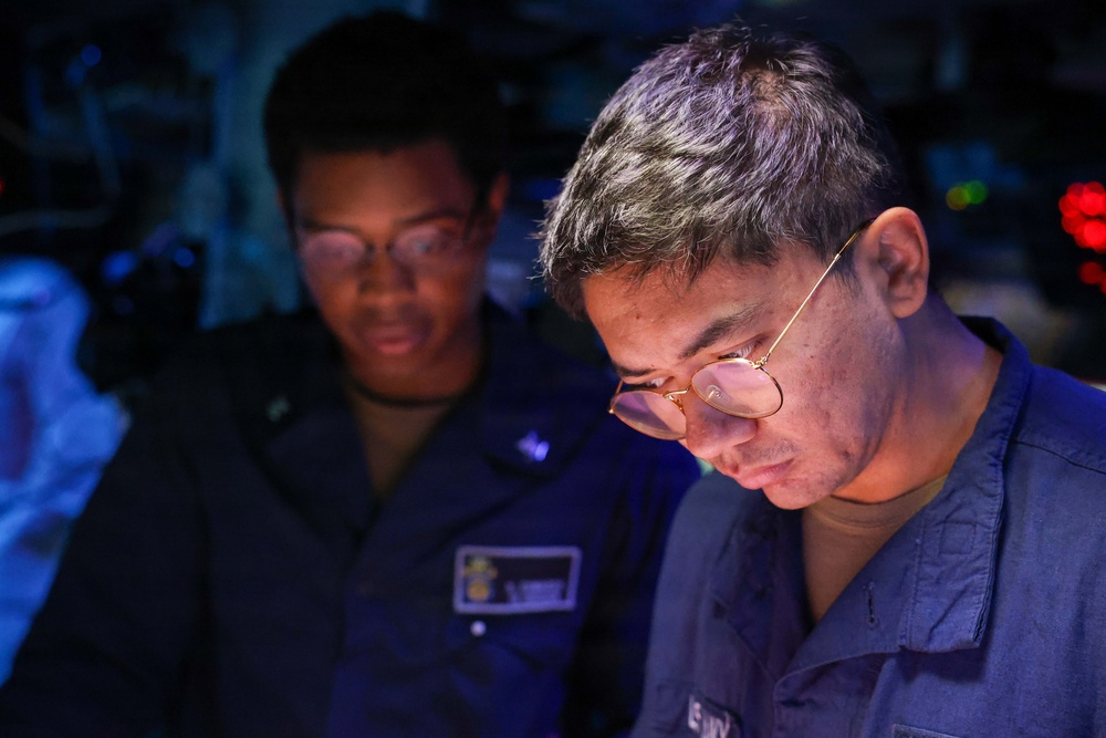 USS John Finn Sailors Stand Watch in the Combat Information Center