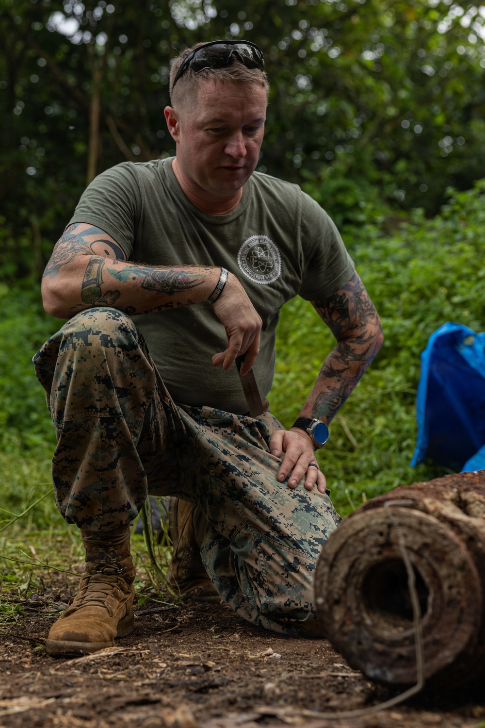 EOD Marines conduct an explosive disposal operation at Ie Shima