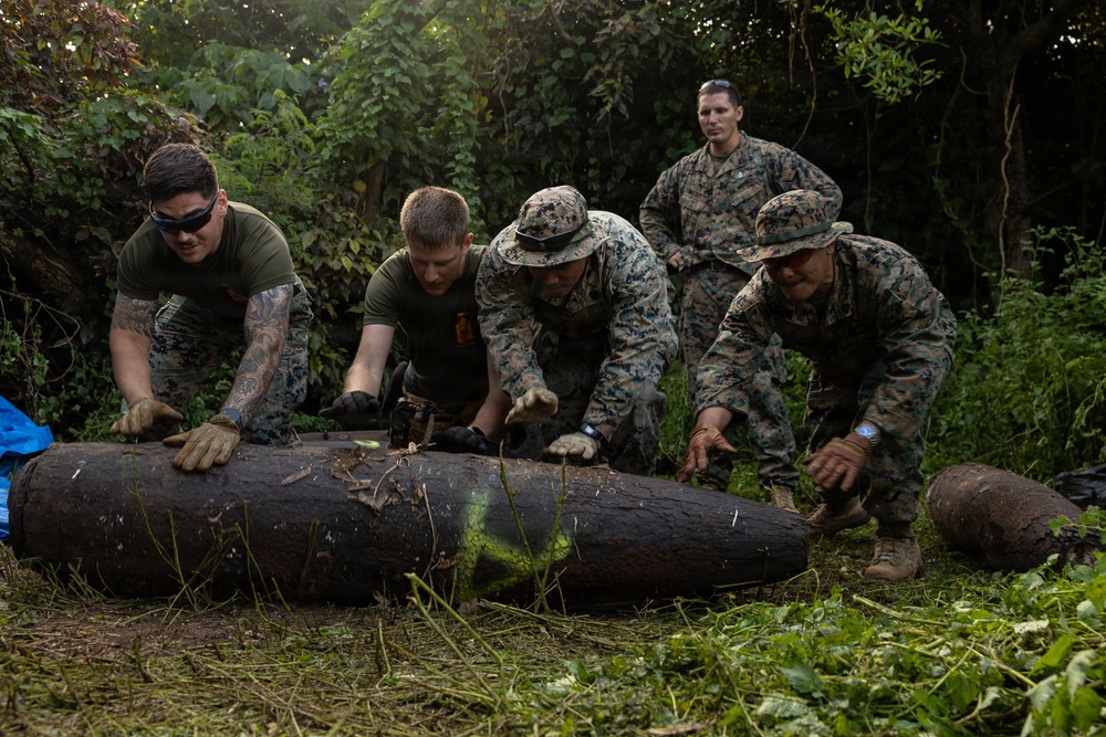 EOD Marines conduct an explosive disposal operation at Ie Shima