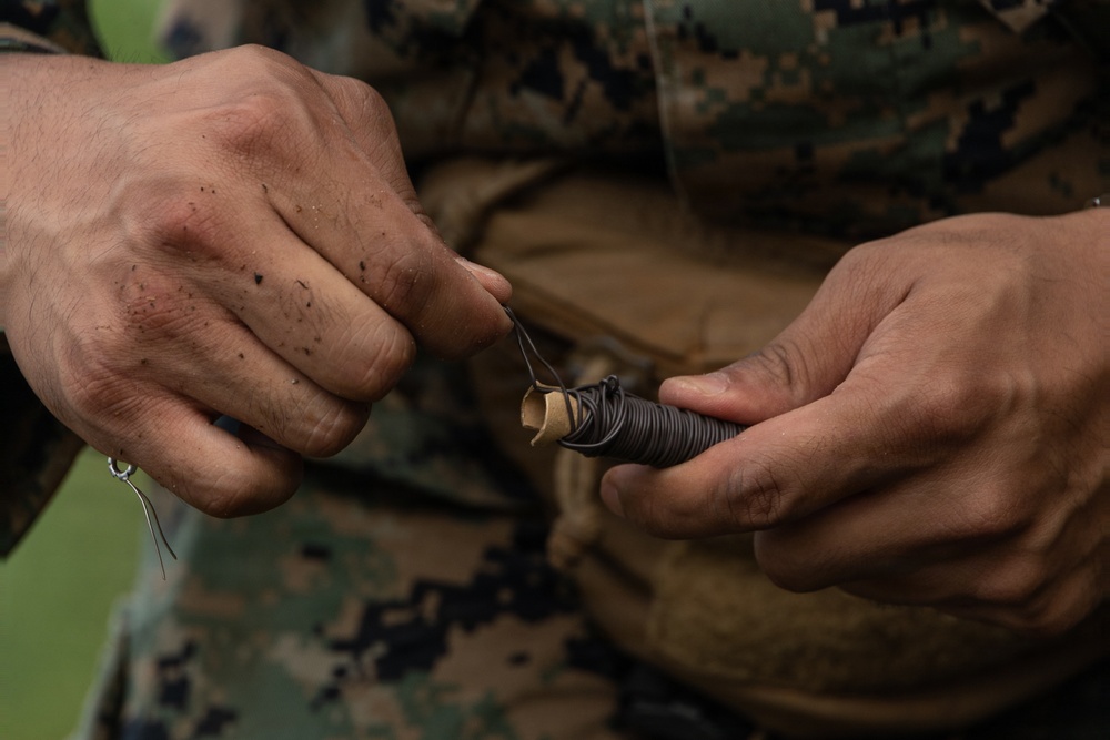 EOD Marines conduct an explosive disposal operation at Ie Shima