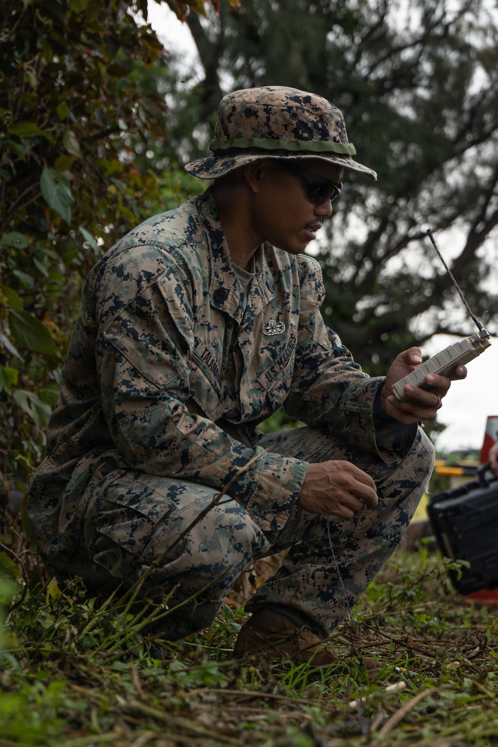 EOD Marines conduct an explosive disposal operation at Ie Shima