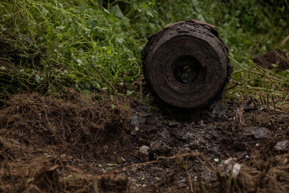 EOD Marines conduct an explosive disposal operation at Ie Shima