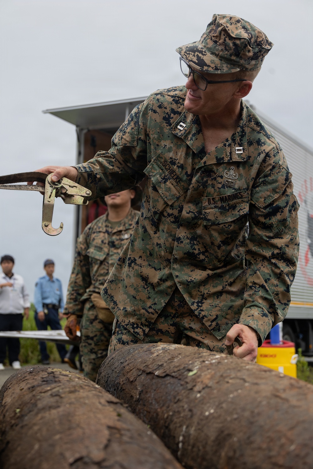 EOD Marines conduct an explosive disposal operation at Ie Shima