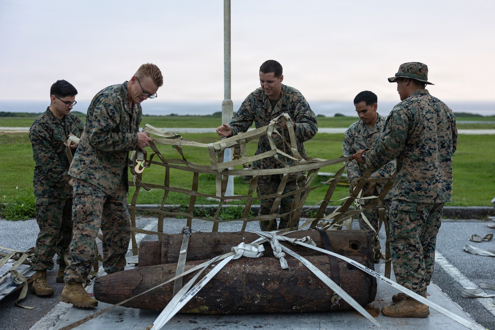 EOD Marines conduct an explosive disposal operation at Ie Shima