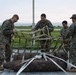 EOD Marines conduct an explosive disposal operation at Ie Shima