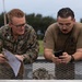 EOD Marines conduct an explosive disposal operation at Ie Shima