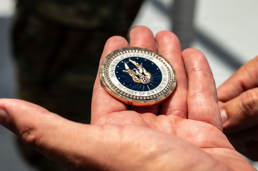 AFRC Command Chief gifts coin to Miami Beach Motor Unit