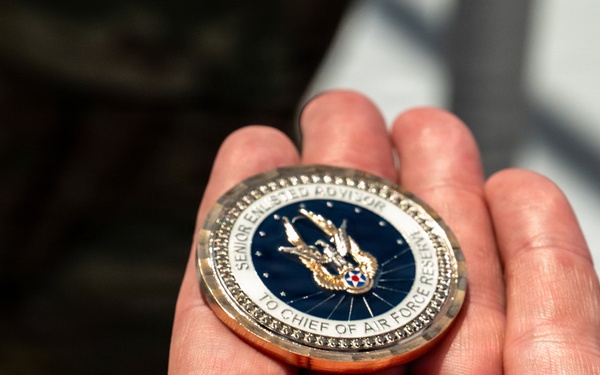 AFRC Command Chief gifts coin to Miami Beach Motor Unit
