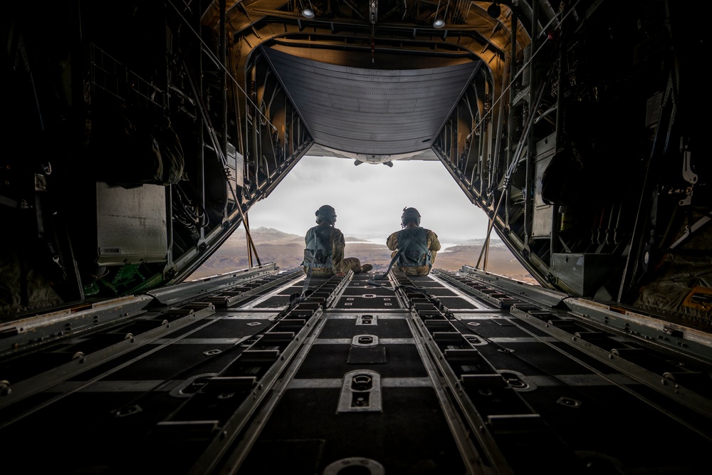 Loadmasters keep watch over the open ramp