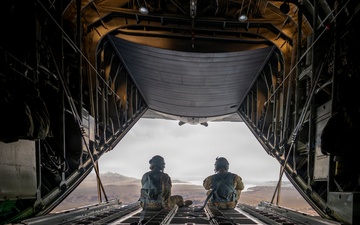 Loadmasters keep watch over the open ramp