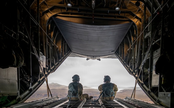 Loadmasters keep watch over the open ramp