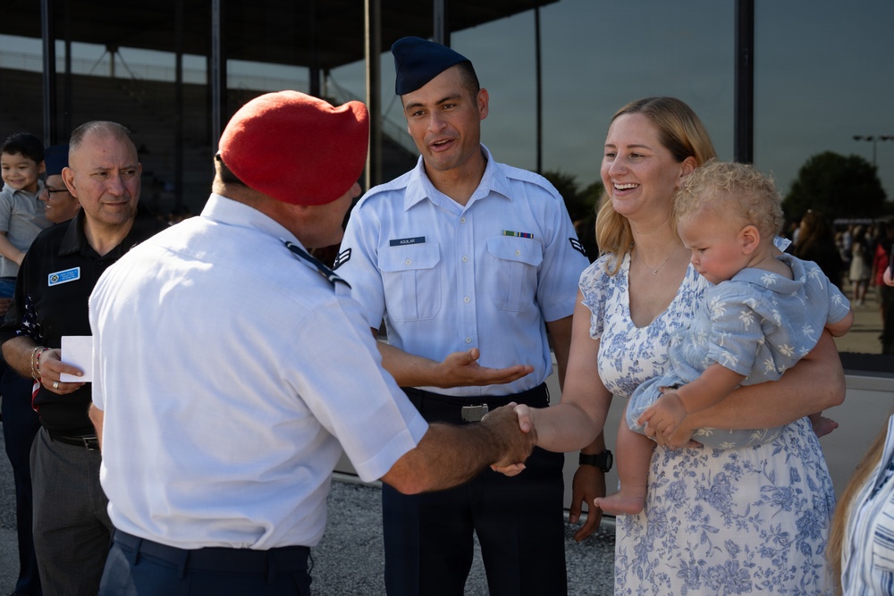 Major General Matthew Wolfe Davidson reviews BMT graduation at JBSA Lackland