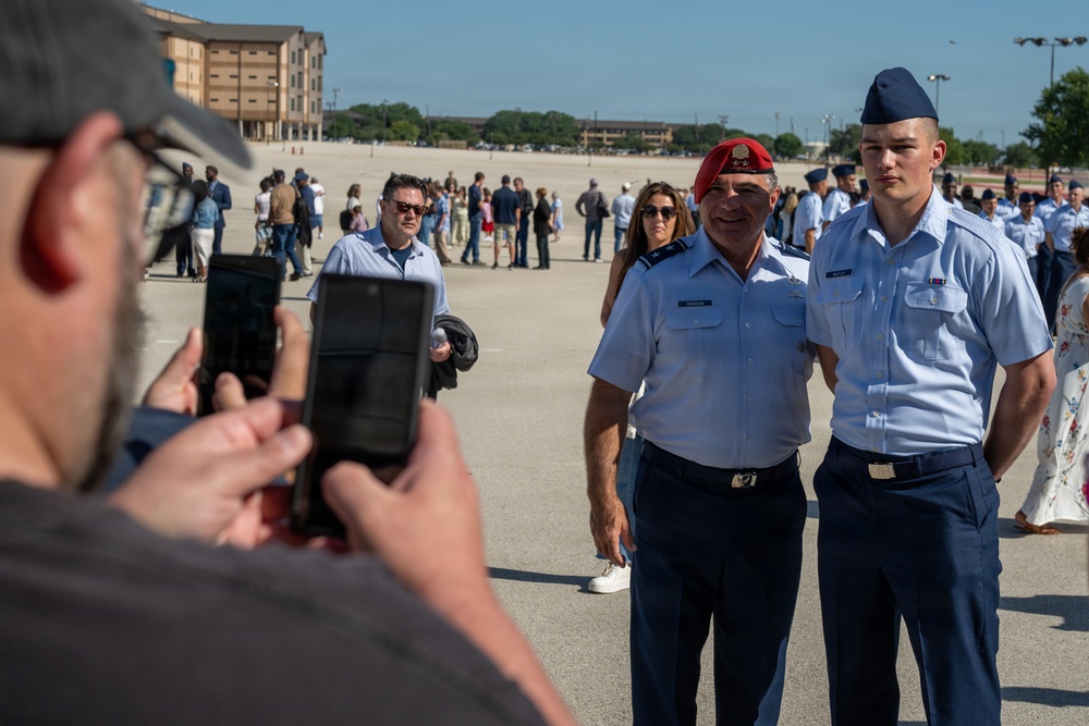 Major General Matthew Wolfe Davidson reviews BMT graduation at JBSA Lackland