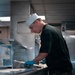USS Ronald Reagan (CVN 76) Sailors Prepare Food in the Galley