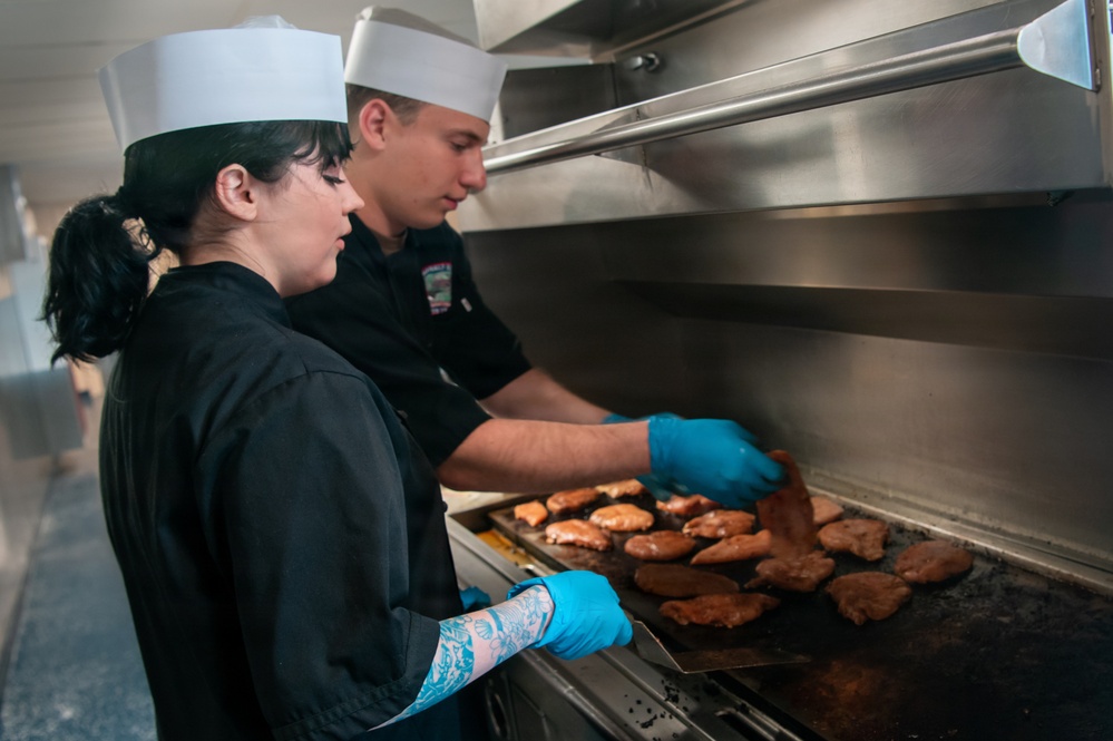 USS Ronald Reagan (CVN 76) Sailors Prepare Food in the Galley