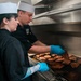 USS Ronald Reagan (CVN 76) Sailors Prepare Food in the Galley