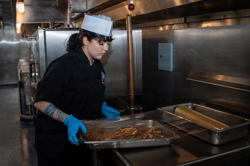 USS Ronald Reagan (CVN 76) Sailors Prepare Food in the Galley